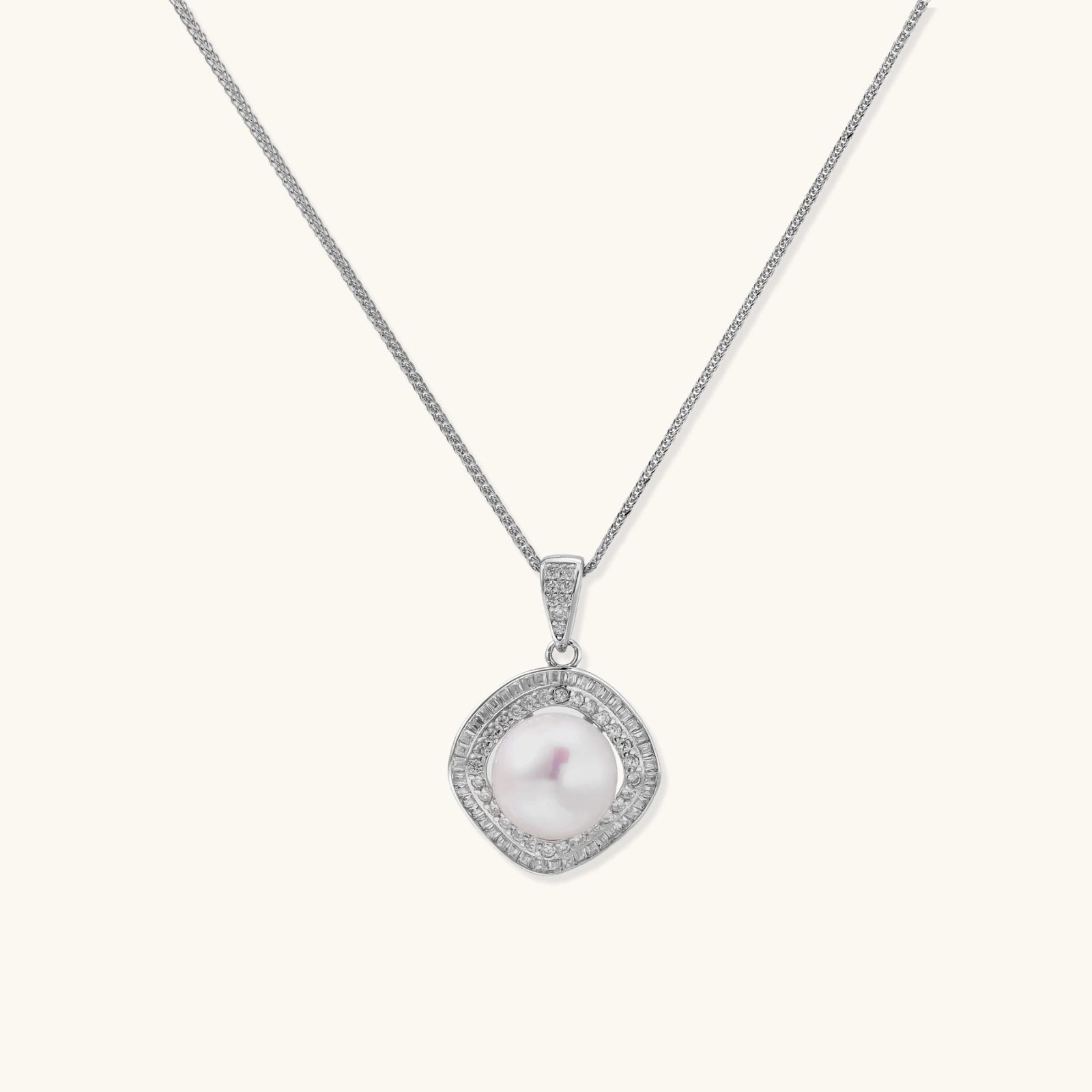 Cushion-shaped double halo pendant with 10mm freshwater pearl center on rhodium-plated sterling silver chain