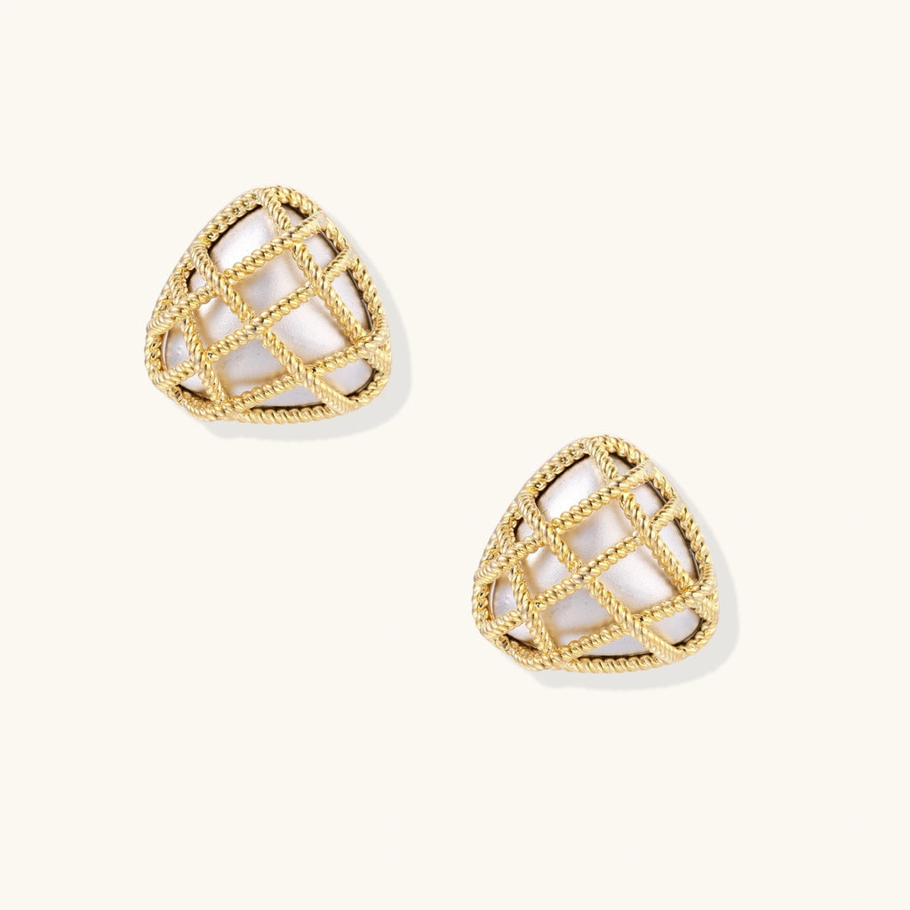 Pair of triangular gold-plated earrings with rope-textured lattice pattern on cream background, dimensional stud design